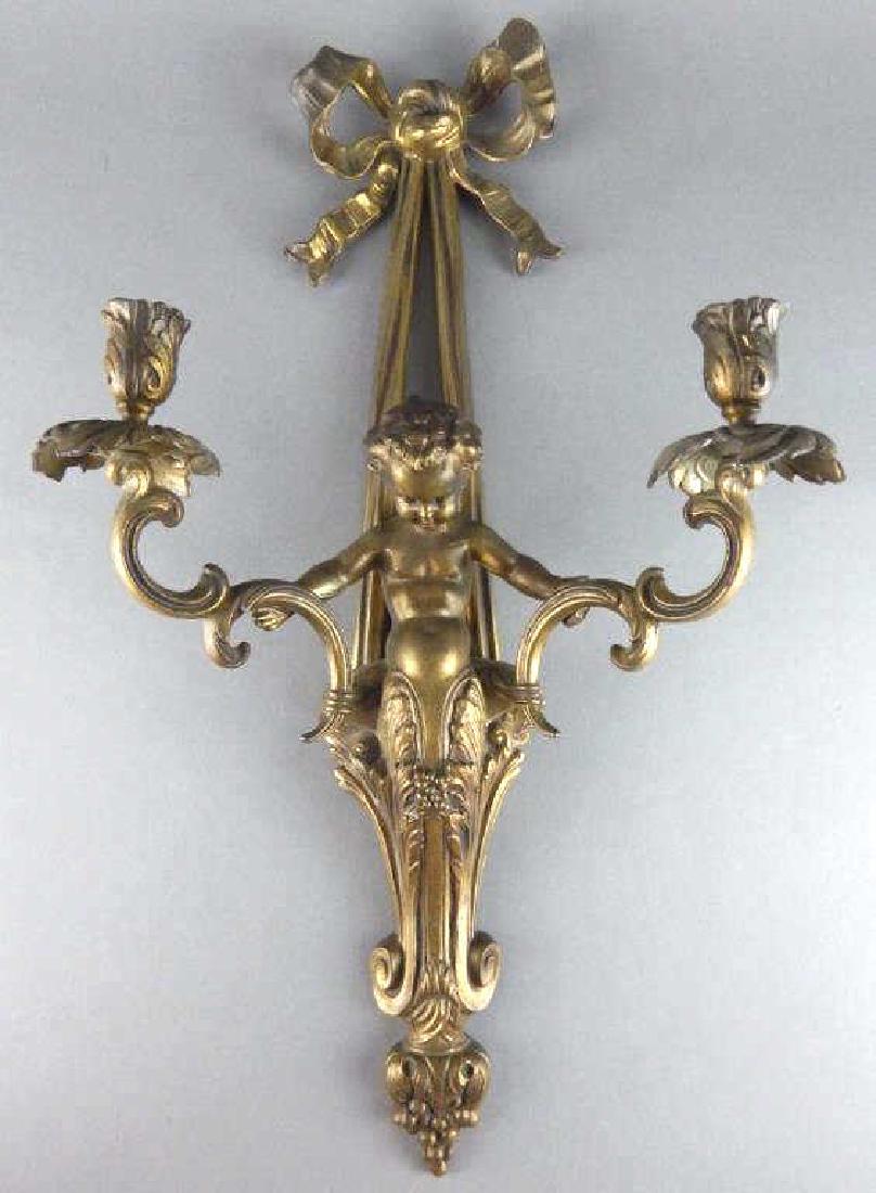 Gilt Metal Cherub Wall Sconce: Measures 21" x 15". Estimate $200 - $300. Starting bid $20.