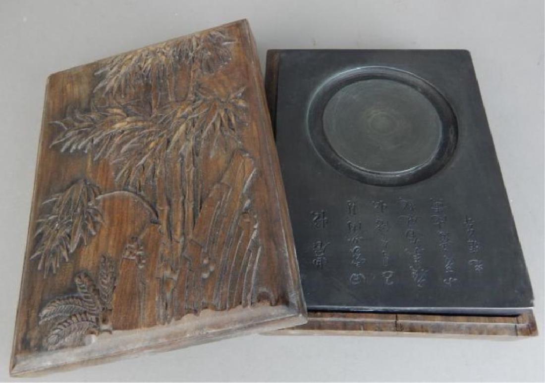 Chinese Inkstone with Trees: Wood warped and cracked. Measures 1 3/4" x 8 1/4" x 6 1/4". Estimate $200 - $300. Starting bid $50.