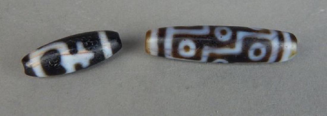 One Nine Eye  and One Dzi Bead (1 of 3)