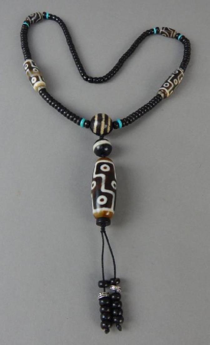 Nine Eye Dzi Bead Necklace. (1 of 5)