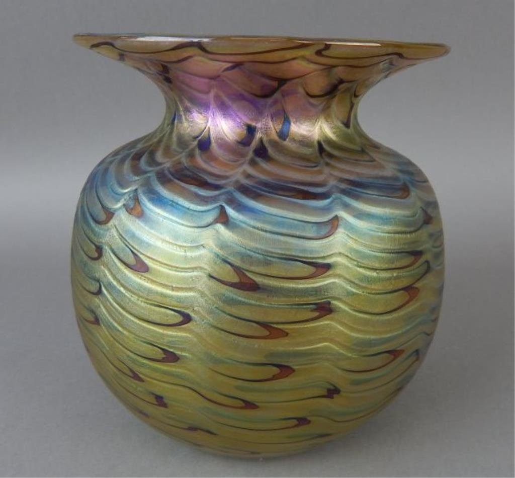 Signed Mario Real Iridescent Vase: Santa Barbara artist. Measures 5" x 4 1/4". Estimate $300 - $400. Starting bid $50.