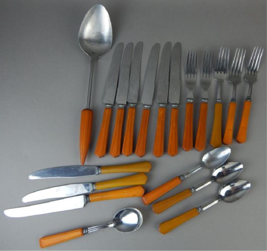 Nineteen Piece Butterscotch Bakelite Utensils. (1 of 4)