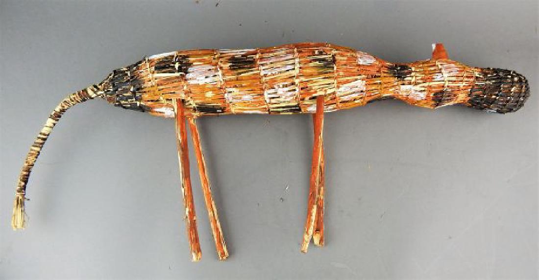 Australian Hand Woven Painted Mimi Spirit Figure: Pandanus tree fiber and pigment, circa 2000. Measures 21". Estimate $100 - $200 Starting Bid $20