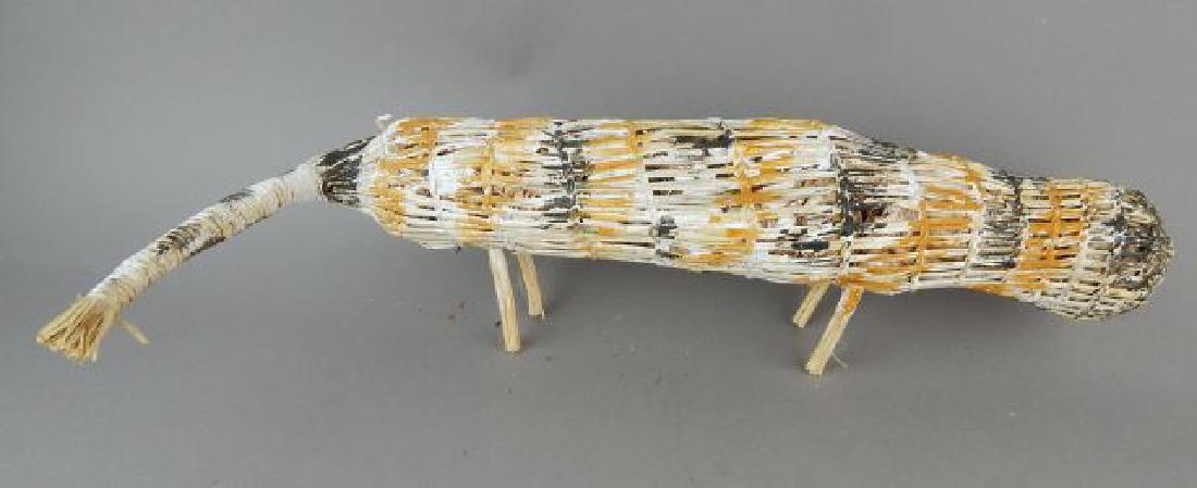 Australian Hand Woven Painted Mimi Spirit Figure: Pandanus tree fiber and pigment, circa 2000. Measures 15". Estimate $100 - $200 Starting Bid $20