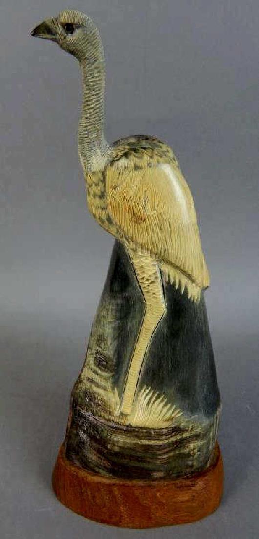 Carved Bone Ostrich By "Barry Stein": Measures 9 1/2". Estimate $300 - $400. Starting bid $50.
