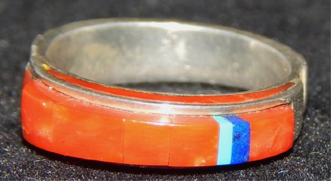Native American Sterling and Coral Ring: Artist signed Beck. Total weight 4.1 grams. Estimate $100 - $200 Starting Bid $20