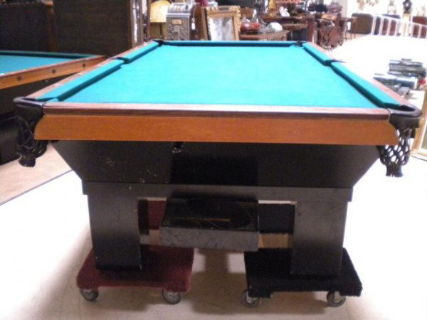 A5-66 ANTIQUE BRUNSWICK POOL TABLE: Measures 2' 7" x 9' 1" x 4' 11". Estimate $1000 - $3000