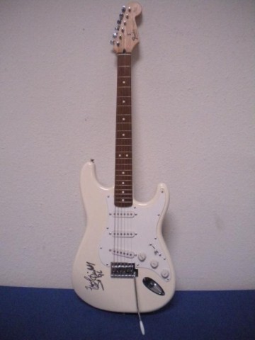 C2-5 "BO DIDLEY" SIGNED FENDER ELECTRIC GUITAR: Squier Strat Solid Body Guitar 3-PU with Tremlo. Like New.