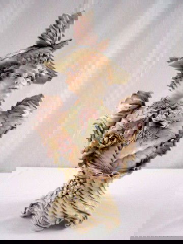 A32-50 AMPHORA BUST OF A LADY: Austrian RSK - Teplitz - Bohemia pottery bust of a lady wearing a pink jacket with puffed sleeves, an intricately designed lace collar, rose on lapel and fancy pink hat topped with a bow. Pedestal cov