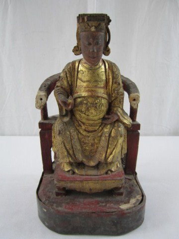 A32-55 CARVED AND GILDED CHINESE STATUE: Carved wood, red lacquer, gilded Chinese emperor seated in chair with feet on a footstool and terminating in a square base. Hand rests on each chair arm are broken off. Circa 1850-1880. Measures 10 3/