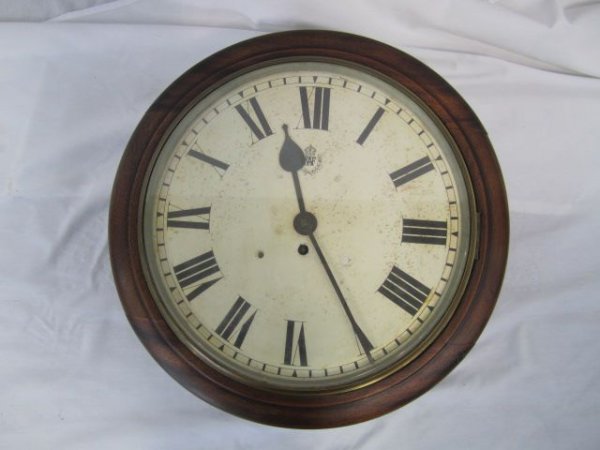 A38-20 WALNUT WALL CLOCK: Measures 18" diameter.