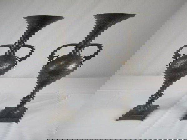 A6-8 PAIR OF PERSIAN ANTIQUE METAL VASES: Measures 15" tall.