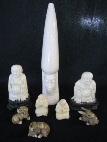 A4-3 LOT OF 8 ASSORTED IVORY ITEMS: Including; large tusk with carved face 10", Budda 4 1/2", Budda 4", and 5 Netskies. All in good condition.