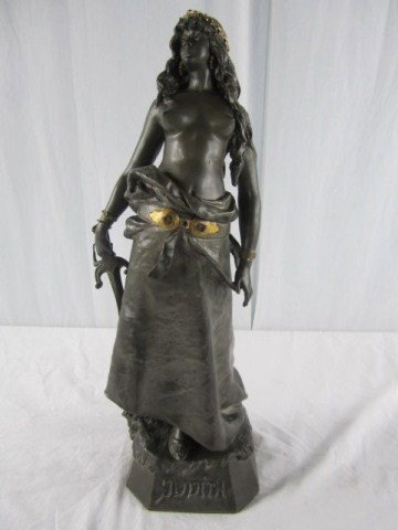 A31-21 ART NOUVEAU FIGURINE: With semi precious jewels in heavy casting. Title "Judith" By artist L. Moreau. Measures 21" tall. Estimate