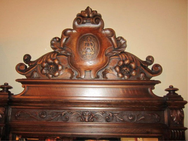 (T5444-D5364) WALNUT CARVED WALL MIRROR: With beveled mirror. In good condition. Measures 8' 1" tall x 40" wide.
