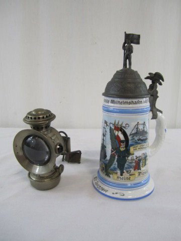 C56-4 GERMAN LITHO PANE STEIN & WALL OIL LAMP: In good condition. Stein measures 10 1/2" tall.