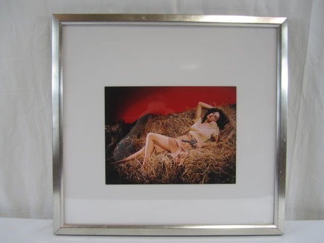 D43-1 JANE RUSSELL CIBA CHROME PHOTO: By George Hurrell. Signed on the back "Hurrell 28/90". In good condition. Photo measures 10 1/2" x 14". Estimate $100 - $300
