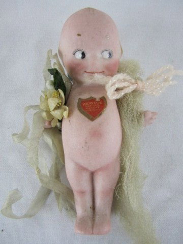 A45-35 ORIGINAL ROSS O'NEILL BISQUE KEWPIE DOLL: Good condition. Measures 4 1/2" tall. Estimate $50 - $150