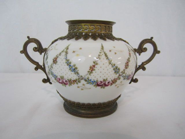 A4-5 LIMOGES HAND PAINTED VASE: With ormolu. Marked on bottom. No lid. Measures 5" tall x 8"wide. Estimate $50 - $100