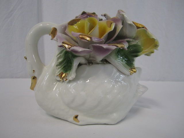 C80-1 CAPODIMONTE DUCK FIGURINE: Measures 5 3/4" tall. Estimate $40 - $60