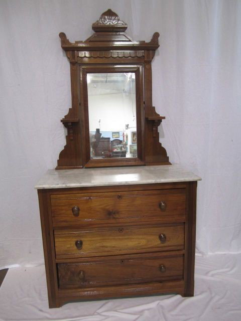 C11-3 VICTORIAN STYLE DRESSER WITH MIRROR: With marble top. Measures 78" tall x 40" wide x 19" deep. Estimate $200 - $400