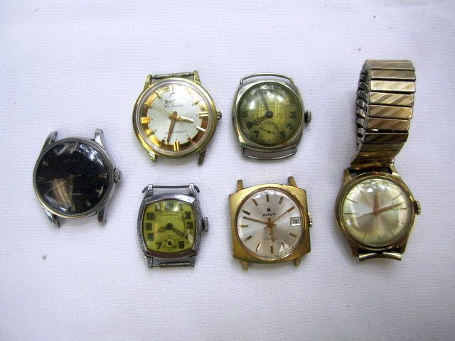 C78-26 LOT OF 6 WATCHES: Including Bulova 30 Jewels, Swiss Cushion, Windsor, Bulova self wind, Benrus, and one unknown. Estimate $100 - $300