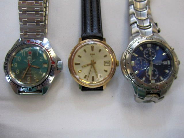 C78-45 LOT OF 3 WATCHES: Including Russian, Citizen Chronograph, and Elgin auto. Estimate $100 - $300