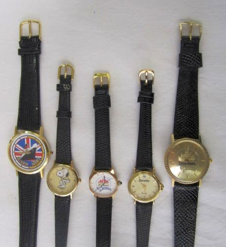 D68-6 LOT OF 5 ASSORTED WATCHES: Includes two Disneyland 30th years, Queen Mary, Dorothy and a Snoopy watch. Estimate $100 - $300