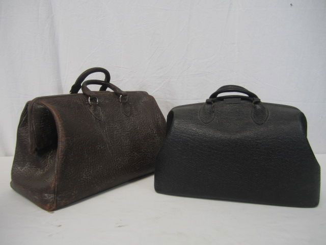A20-1 LOT OF 2 OLD LEATHER BAGS: One is a large doctors bag and WWII Valise Maritime bag. Estimate $100 - $200