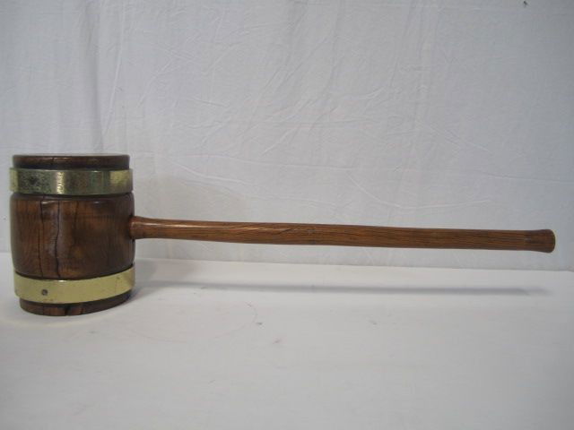 A20-9 OLD CIRCUS OR SHIPYARD MALLET: With brass trim. Measures 35" long. Estimate $100 - $300