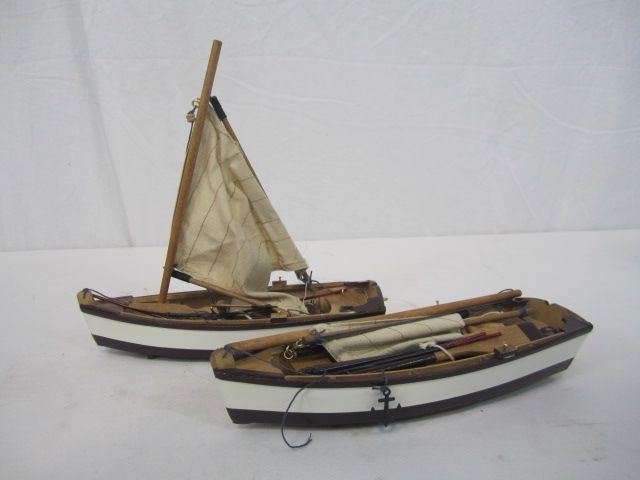 C98-20 PAIR OF SMALL WOODEN SAIL BOATS: Measures 8" tall x 8 1/2" long. Estimate $30 - $60