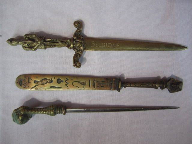 A44-35 LOT OF 3 BRASS LETTER OPENERS: Knight, Egyptian and claw with ball. Measure 10" long. Estimate $200 - $300