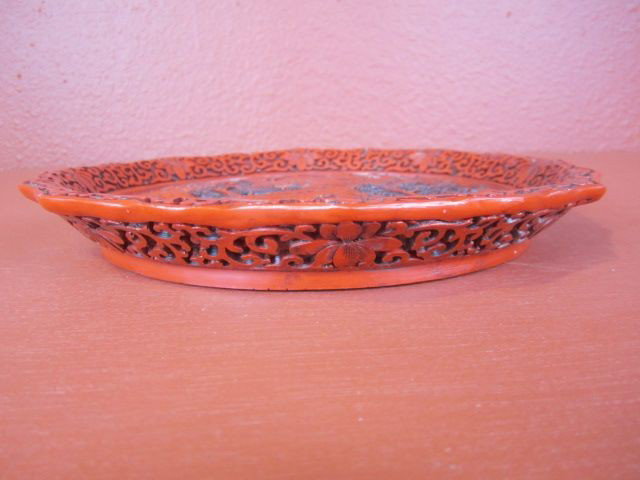 F29-8 CINNABAR PLATE: Measures 1 1/4" tall x 3 3/4" diameter. Estimate $200 - $400