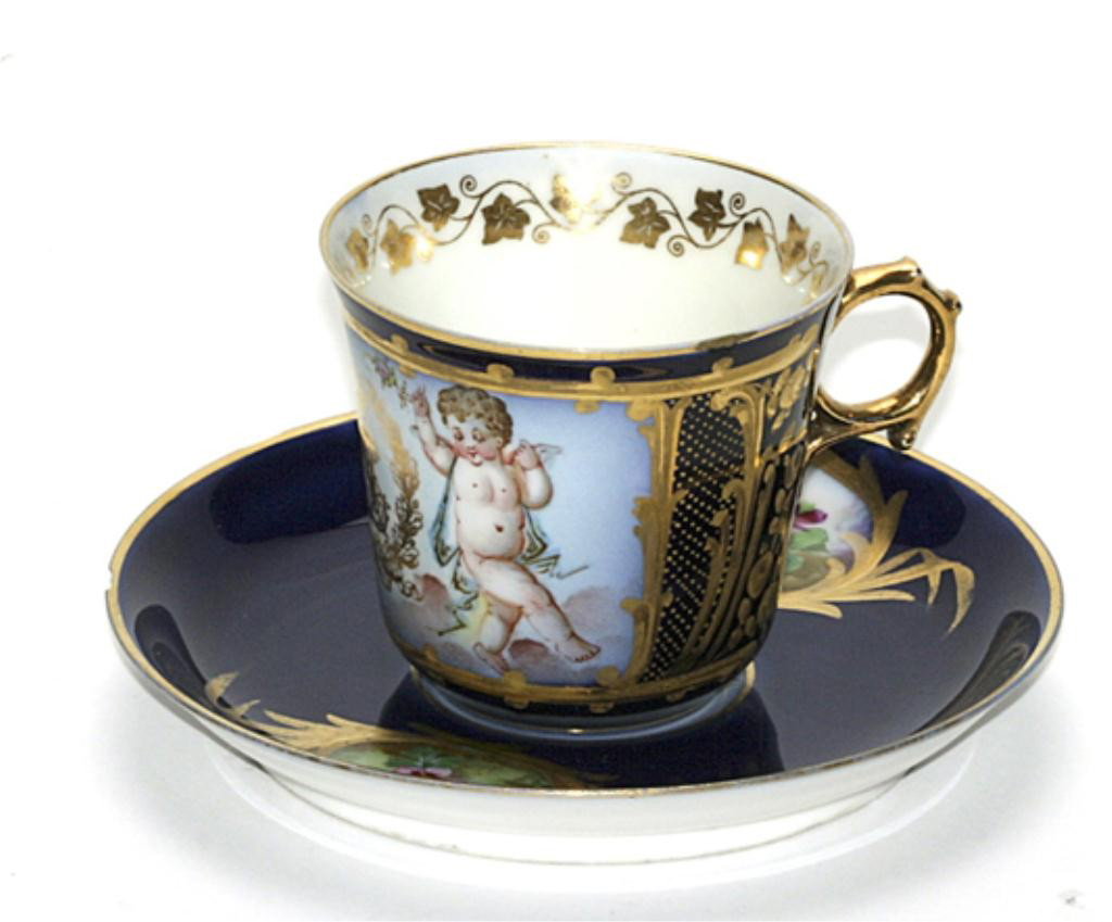 F60-185 SEVRES DEMITASSE CUP & SAUCER: Cup measures 2 1/2" tall and saucer 5" diameter. Estimate $400 - $700