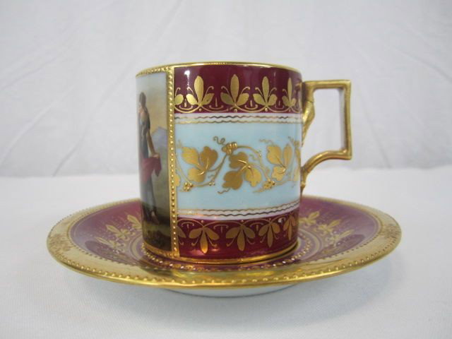 F60-150 ROYAL VIENNA CUP & SAUCER: Marked on bottom. Cup measures 2 1/2" tall and saucer 5" diameter. Estimate $100 - $300