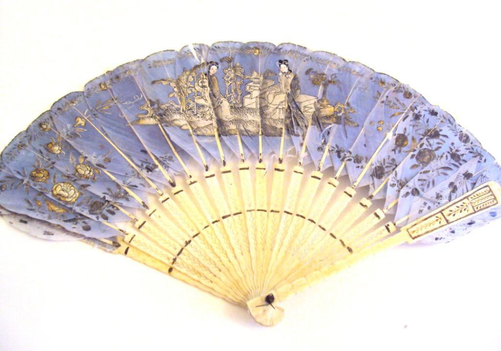 F60-337 BLUE FEATHER & IVORY HANDLE FAN: Painted with Asian scenes. Estimate $150 - $350