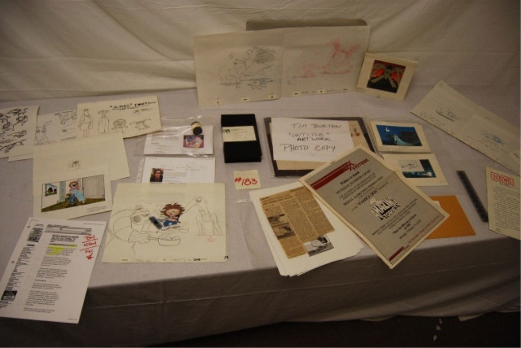 TIM BURTON'S FAMILY DOG CELS & ORIG DRAWINGS: 1 Family Dog sketch believed to be by Tim Burton & 1 story card of sketch. 1 story card background and overlay. 1 family dog production drawing dog with Buffy. 1 - 35mm 11 frame set. 7 family dog stor