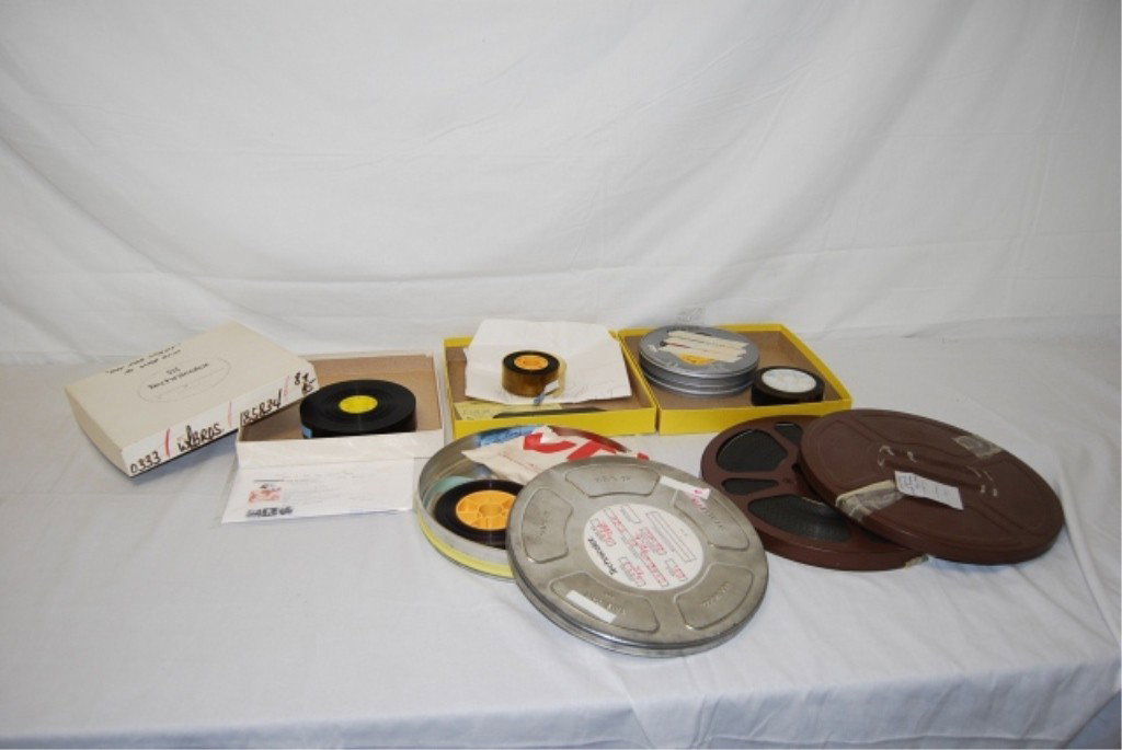 COLLECTION OF FILM REELS: Includes 1 Wooly Bully small film reel. 1 Wooly Bully film reel in case. "The Magic Cloak" American Motion Picture reel. 1 Chariots of Fire Trailer in Can. 1 Day For Night Clip from 1973. 2 small logo