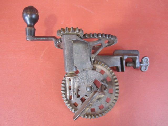 A44-30 ANTIQUE APPLE PEELER: Measures 7 1/4" tall x 8 1/2" wide. Estimate $200 - $500