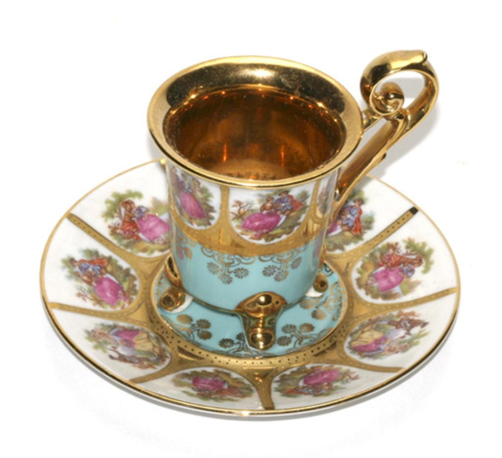 F60-151 ROYAL VIENNA CUP & SAUCER: Marked on bottom. Cup measures 3 1/2" tall and saucer 5" diameter. Estimate $150 - $350