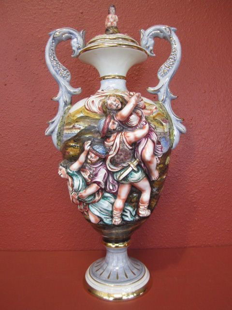 A25-1 RARE VINTAGE CAPODIMONTE VASE: Signed on bottom " Capodimonte Made In Italy Bernini #1289." Vase has a minor chip on the bottom. Measures 24 1/2" tall x 13" wide. Estimate $200 - $400