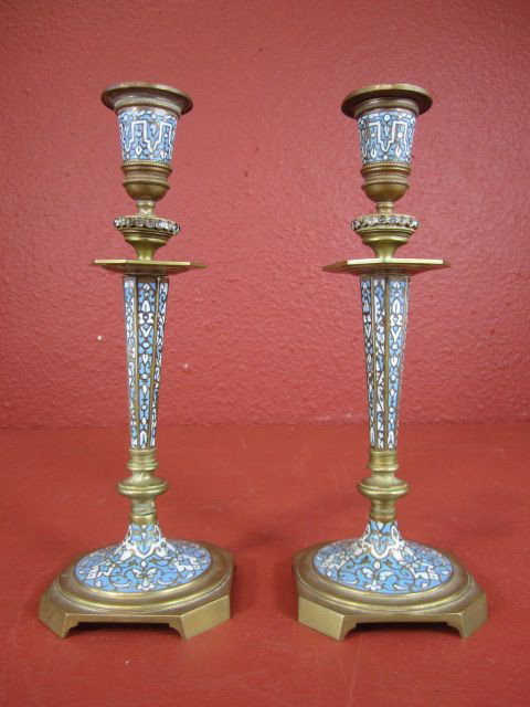 A55-16 PAIR OF FRENCH GILT BRONZE CANDLE STICKS: With Champleve, Enamel and Crystal. 19th Century. Measures 9 1/2" tall. Estimate $900 - $1,500
