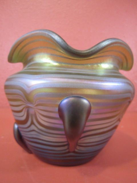 A31-15 LOETZ GLASS VASE: Iridescent vase with wavy pattern. Circa 1925. Measures 6 1/4" tall. Estimate $5,500 - $7,500