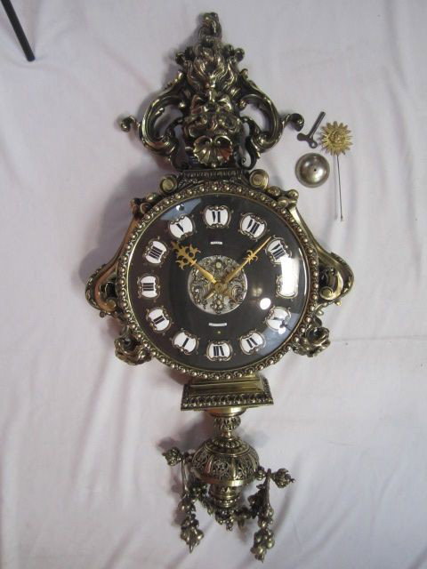 A11-74 TIFFANY & CO WALL CLOCK: Measures 47" tall x 21 1/4" wide. Estimate $15,000 - $25,000