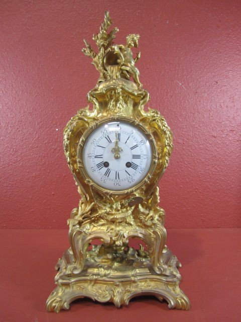 E22-32 FRENCH BRONZE ORMOLU CLOCK: Measures 20" tall x 11" wide.