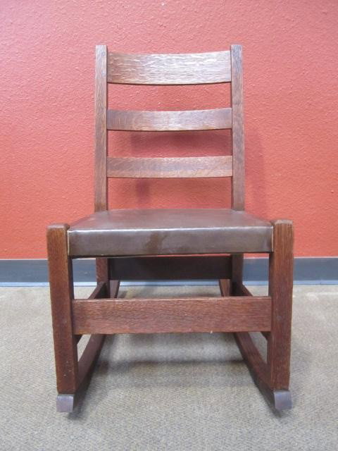 A44-21 SIGNED "L & JG STICKLEY" ROCKING CHAIR: Measures 37 1/2" tall x 18 3/8" wide x 16 1/2" deep.