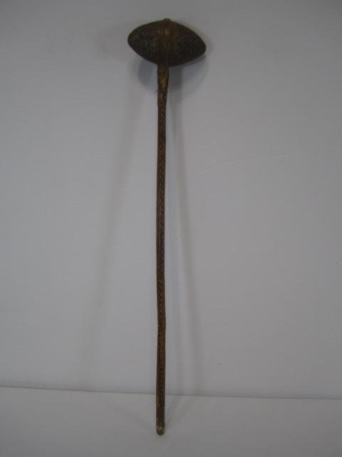 E32-5 SIOUX GRANITE STONE CLUB: Circa 1862. Bi-pointed granite stone club head on 23 1/2" wood handle, covered and attached to stone head with raw hide. Head formed by pecking. With Certificate of Authenticity. Estimate $500 - $800