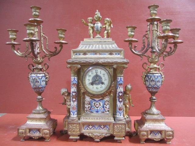 A48-7 BRONZE 3 PIECE CLOCK SET: Measures 21 1/4" tall x 12" wide x 6 1/2" deep. Estimate $3,500 - $5,000