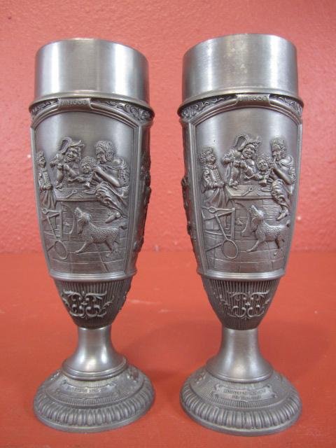 E12-6 PAIR OF GERMAN WMF PEWTER CHALICE'S: Depicting art masters. Stamped on underside. Each measure 7" tall. Estimate $100 - $300