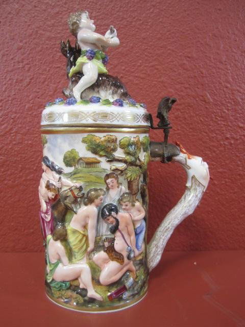 A6-40 ANTIQUE CAPODIMONTE STEIN: Measures 11" tall. Estimate $900 - $1,500